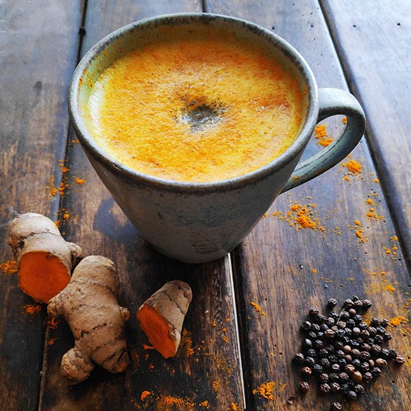 Turmeric latte with black peppercorns